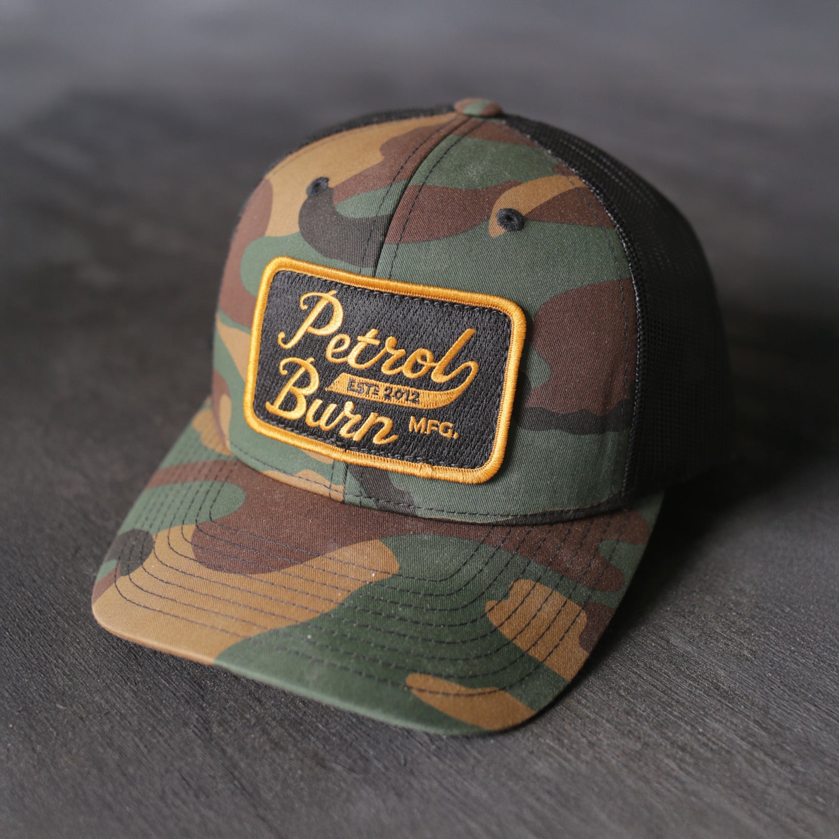 18-Year Logo Curved Bill Camo