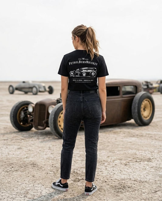 female wearing a black hot rod tshirt from petrol burn