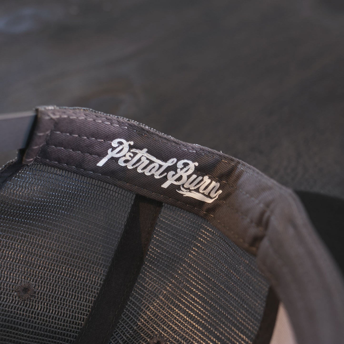 18-Year Logo Camo Patch Trucker