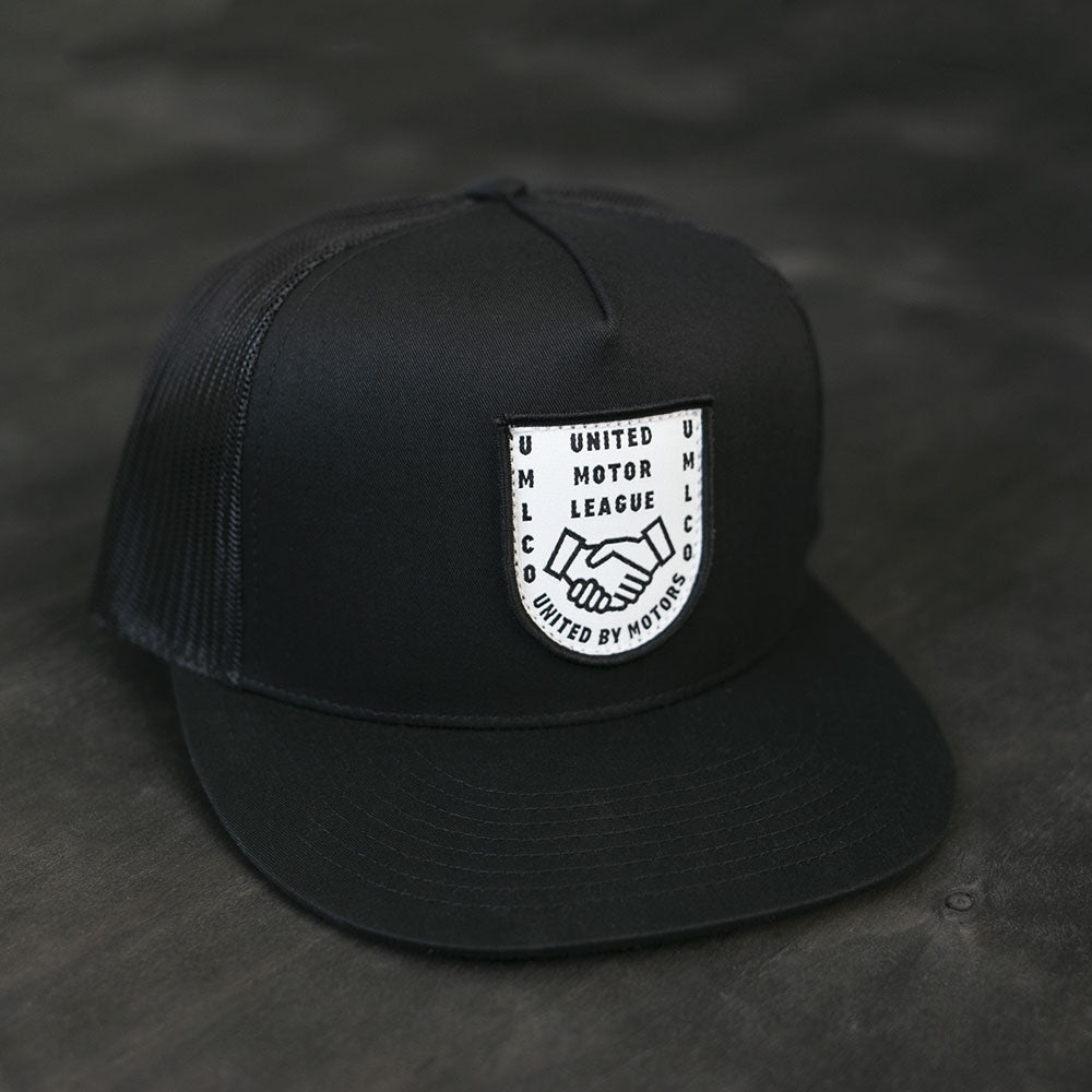 umlco gentlemans badge trucker hat