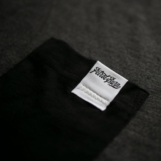 petrol burn pocket tee logo label