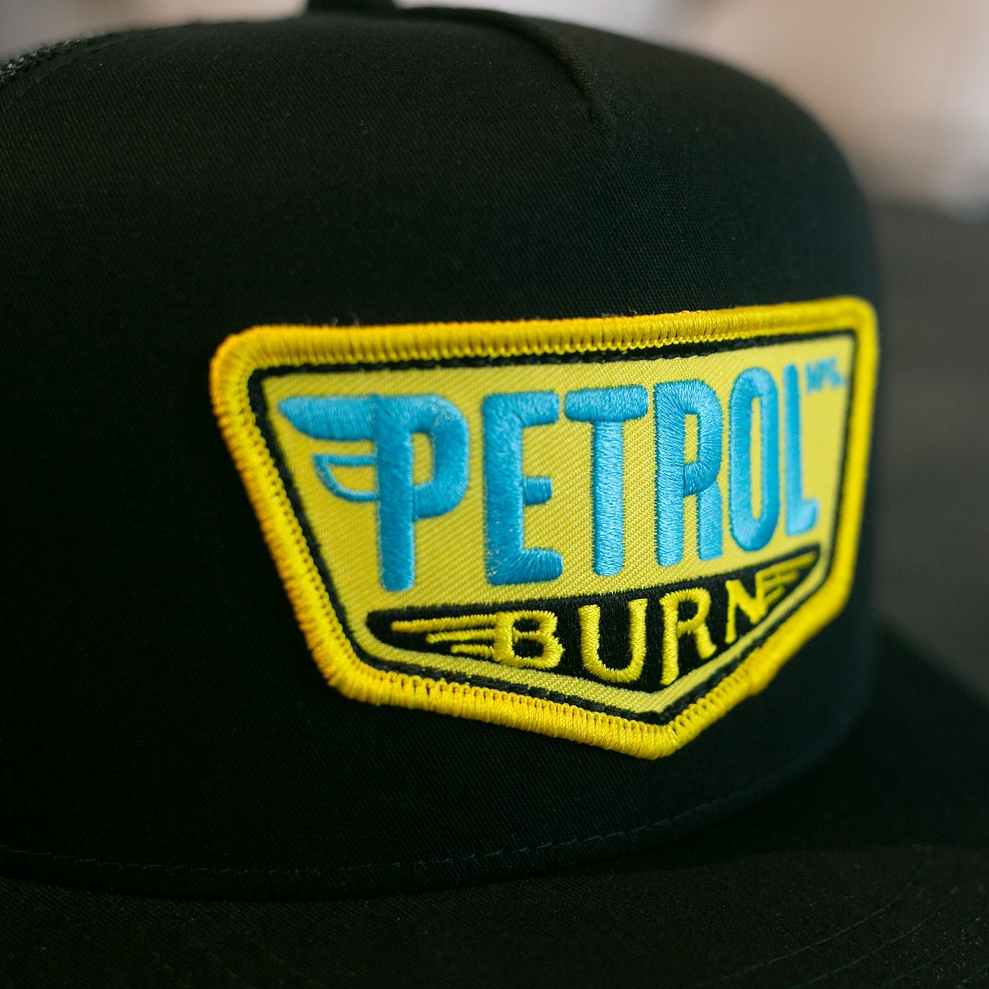 petrol burn curved bill hat black