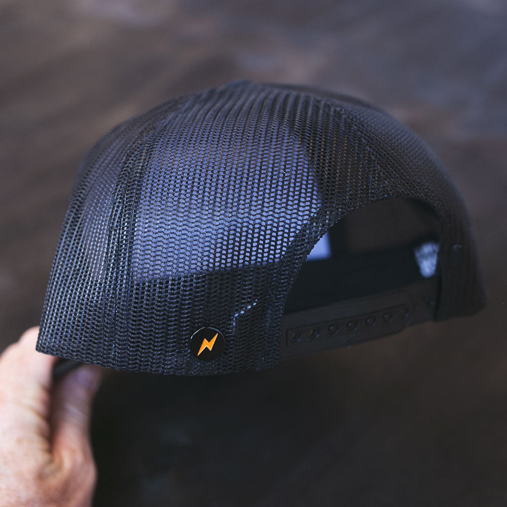 petrol burn metal bolt button hat detail