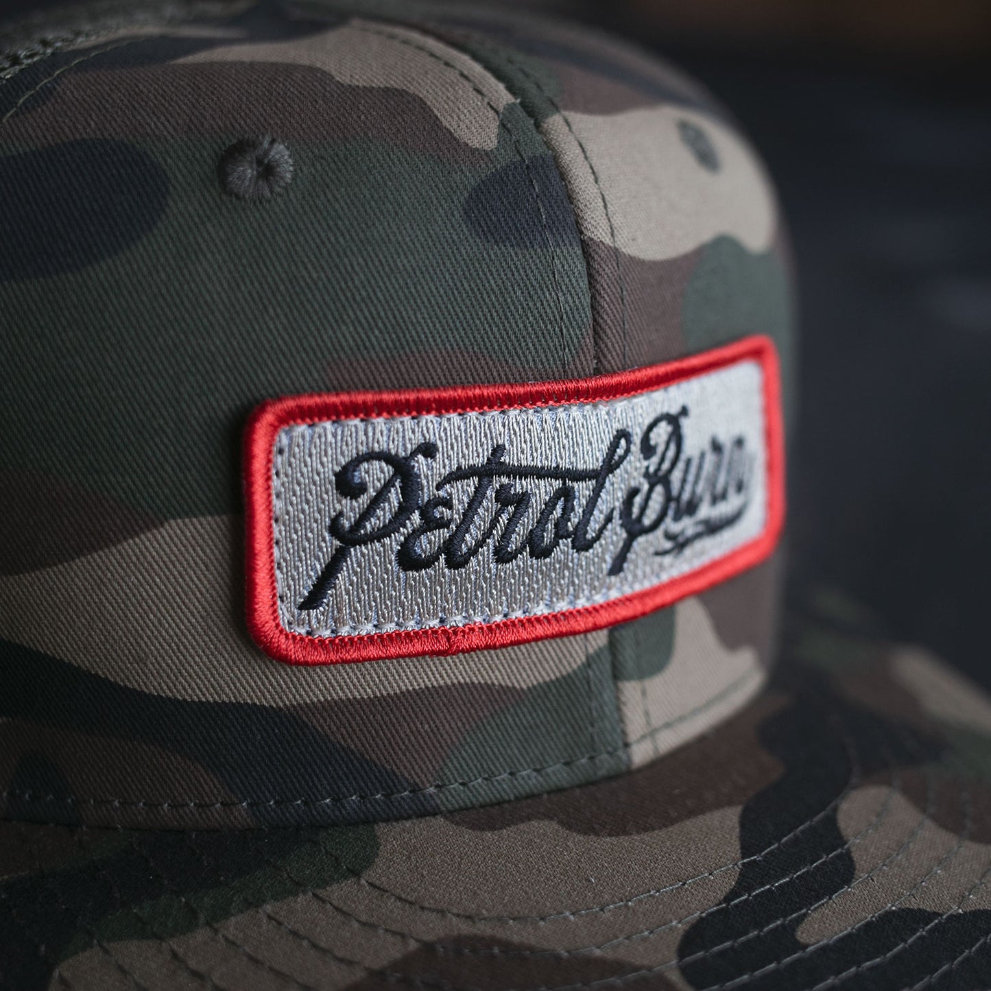 Burn Logo Camo Trucker