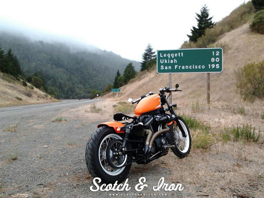harley davidson cafe racer style clip on bars shorty exhaust orange paint scotch and iron