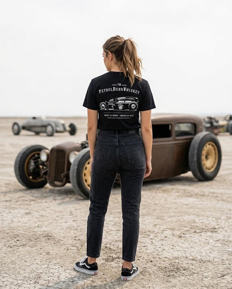 female wearing a black hot rod tshirt from petrol burn