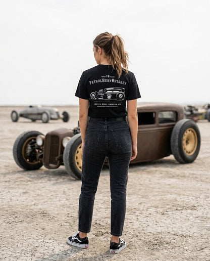 female wearing a black hot rod tshirt from petrol burn