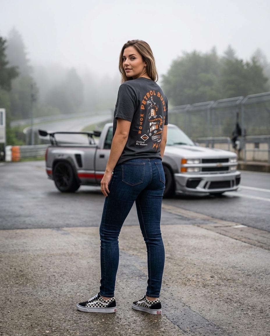 female wearing a black petrol burn car lifestyle tshirt