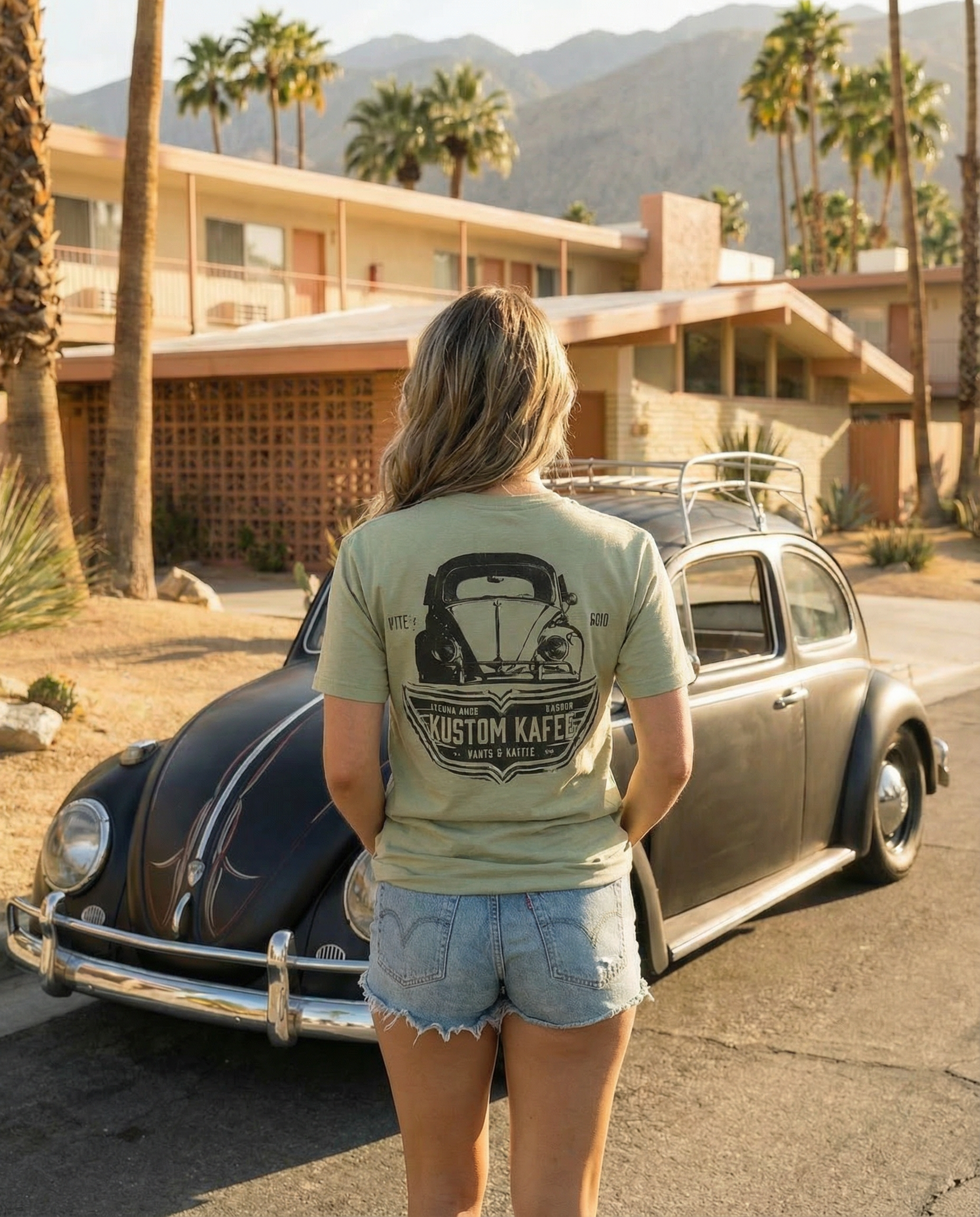 female wearing a petrol burn vintage VW tshirt