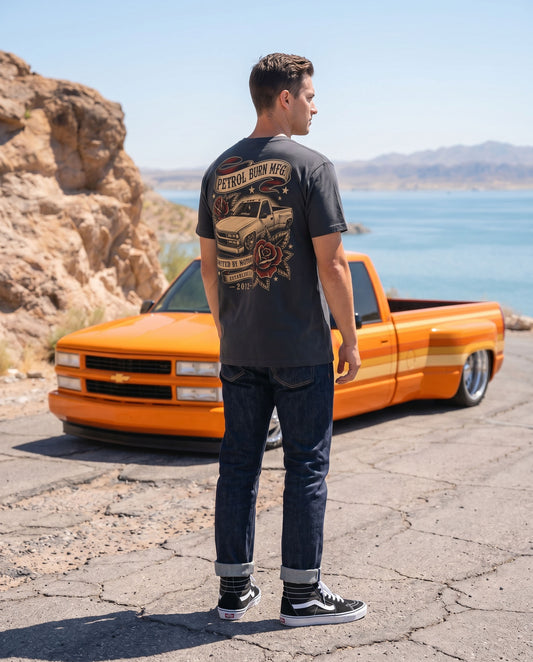 man wearing a bagged chevy dually black tshirt