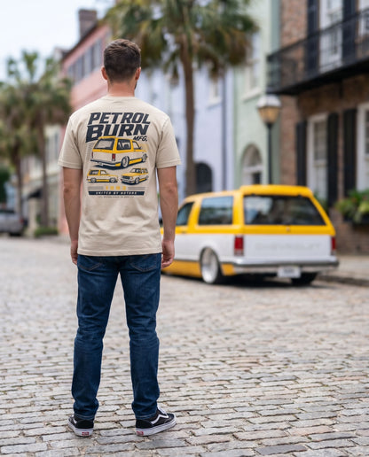 man wearing a petrol burn tshirt with a bagged chevy blazer