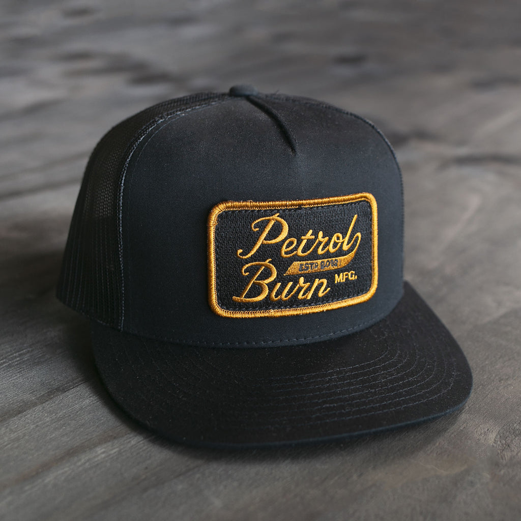 18-Year Logo Black Trucker Bronze