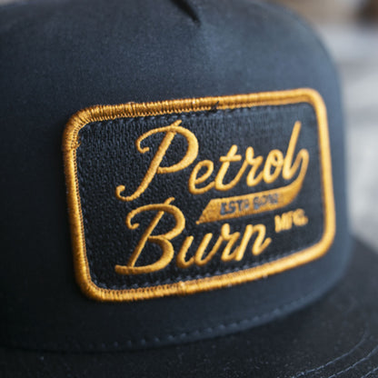 18-Year Logo Black Trucker Bronze