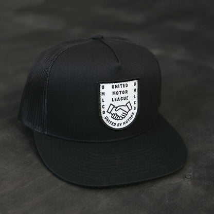 umlco gentlemans badge trucker hat