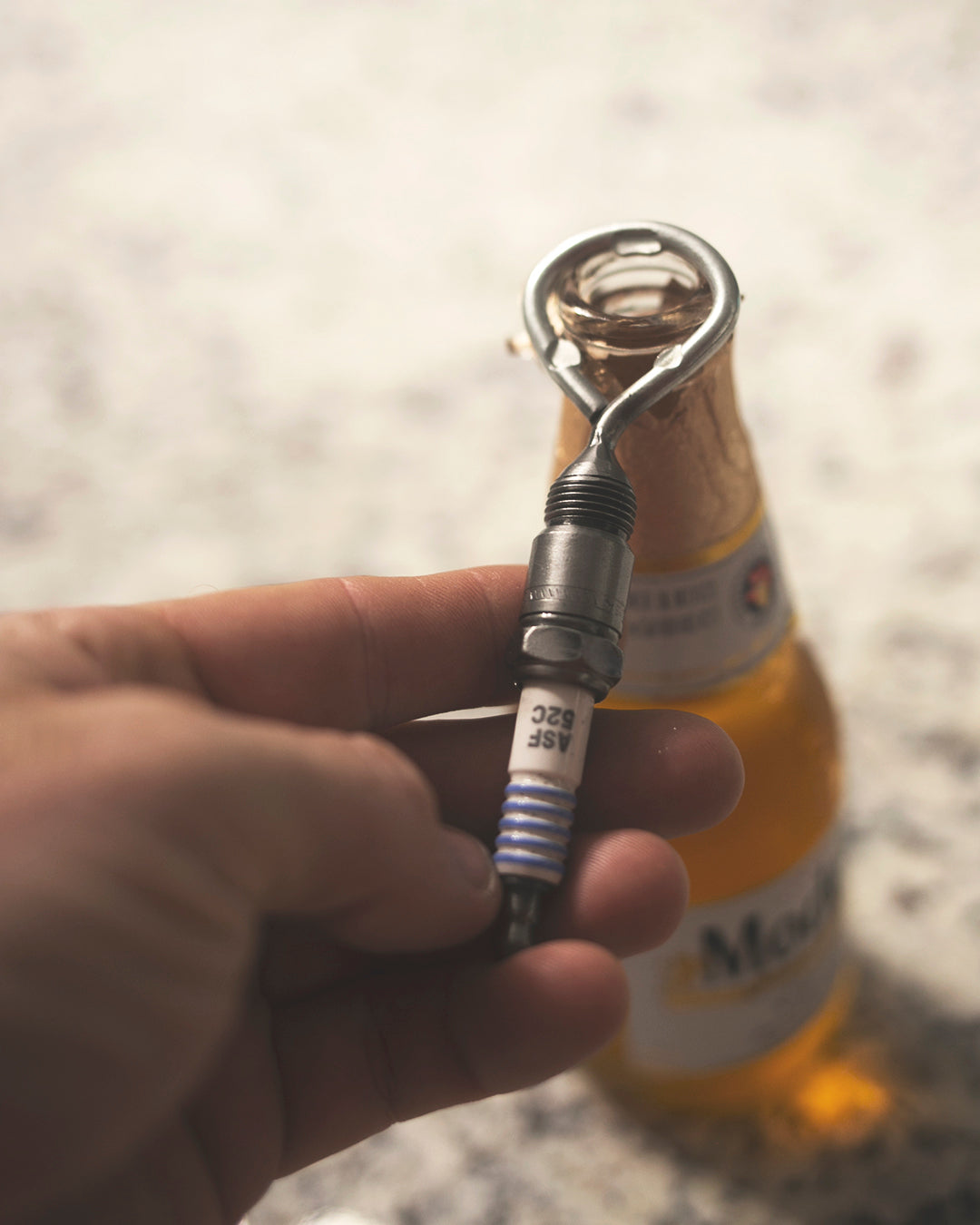 sparkplug bottle opener