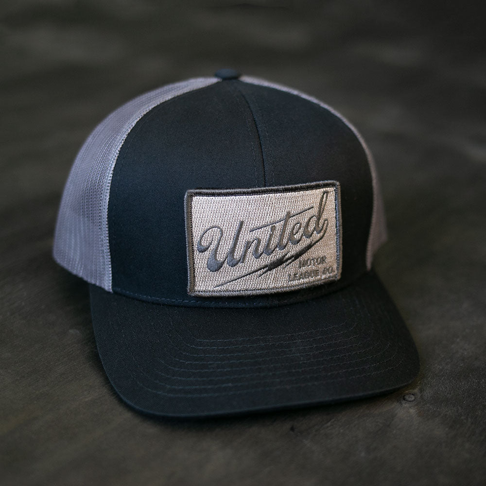 umlco curved bill bolt logo hat